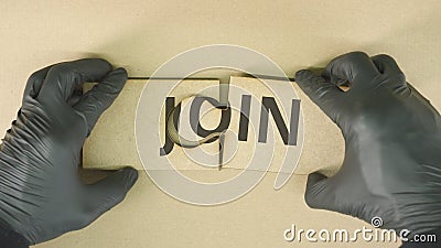 JOIN word on cardboard jigsaw puzzle pieces Stock Photo