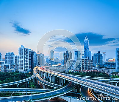 Complicated highway intersection at dusk Stock Photo