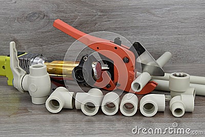 Components making water pipes. Tools for doing waterworks. Stock Photo