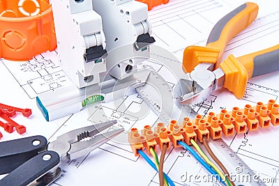 Components for use in electrical installations. Cut pliers, connectors, fuses and wires. Accessories for engineering work. Stock Photo