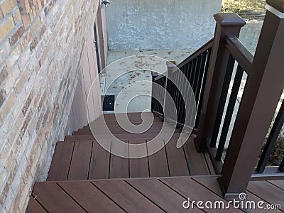 Composite deck with pecan decking and mocha railing Stock Photo