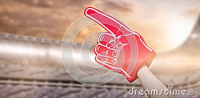 Composite image of american football player holding supporter foam hand 3d Stock Photo