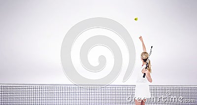 Composite image of athlete holding a tennis racquet ready to serve Stock Photo