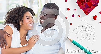 Composite image of attractive couple cuddling on the couch Stock Photo