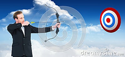 Composite image of businessman shooting a bow and arrow Stock Photo