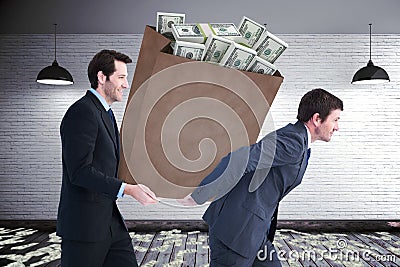 Composite image of businessmen carrying bag of dollars Stock Photo