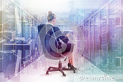 Composite image of businesswoman sitting on swivel chair with tablet Stock Photo