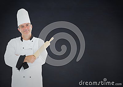 Composite image of Chef with rolling pin against navy background Stock Photo