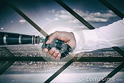 Composite image of digital composite image of businessman and robot shaking hands Stock Photo