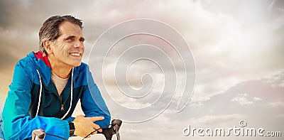 Composite image of digital composite of senior man with his bike Stock Photo