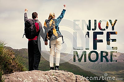 Composite image of excited couple reaching the top of their hike and cheering Stock Photo