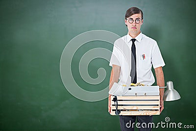 Composite image of fired businessman holding box of belongings Stock Photo