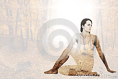 Composite image of fit woman doing the half spinal twist pose in fitness studio Stock Photo