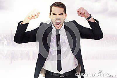 Composite image of furious businessman tensing arms muscle Stock Photo