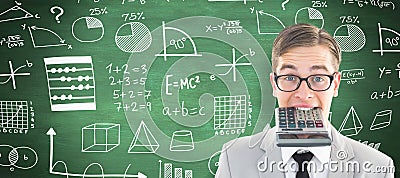 Composite image of geeky smiling businessman biting calculator Stock Photo