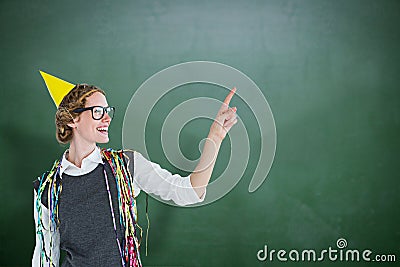 Composite image of happy geeky hipster pointing something Stock Photo