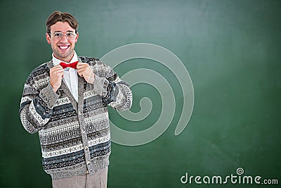 Composite image of happy geeky hipster with wool jacket Stock Photo