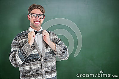 Composite image of happy geeky hipster with wool jacket Stock Photo