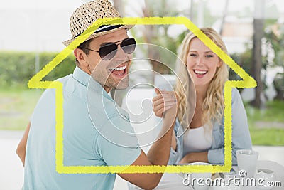 Composite image of hip young couple having coffee together Stock Photo