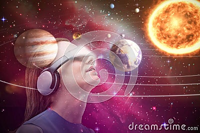 Composite image of low angle view of brunette using virtual reality simulator 3d Stock Photo
