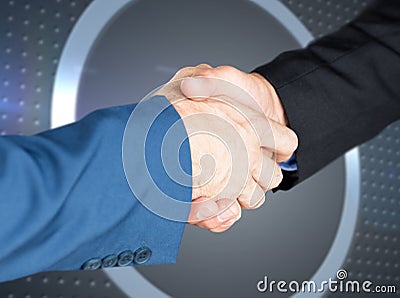 Composite image of male executives shaking hands Stock Photo