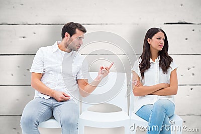 Composite image of man pleading with angry girlfriend Stock Photo