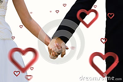 Composite image of mid section of newlywed couple holding hands in park Stock Photo