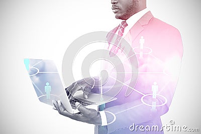 Composite image of midsection of businessman using laptop 3d Stock Photo