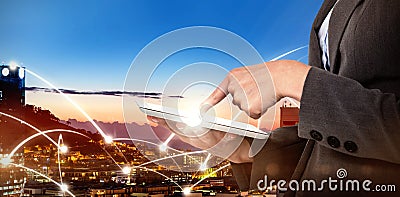 Composite image of midsection of businesswoman using digital tablet Stock Photo