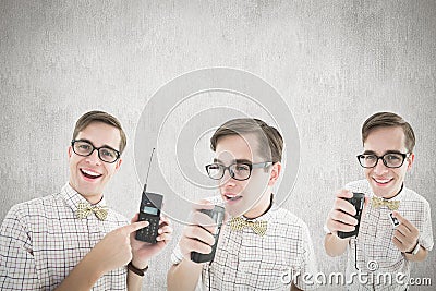 Composite image of nerd with tape recorder Stock Photo