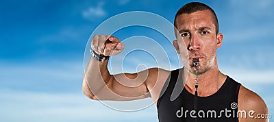 Composite image of portrait of attentive trainer blowing his whistle Stock Photo