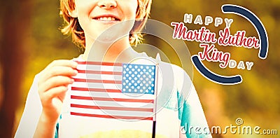 Composite image of portrait of cute boy showing american flag Editorial Stock Photo