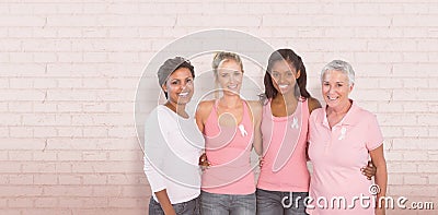 Composite image of portrait of happy women supporting breast cancer social issue Stock Photo