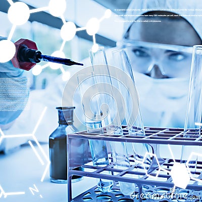 Composite image of protected female scientist dropping blue liquid in a test tube Stock Photo