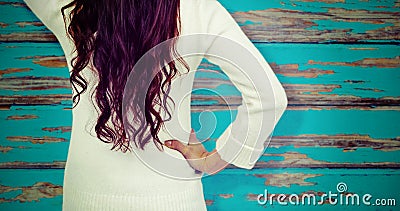 Composite image of rear view of confused woman with hand in hair Stock Photo