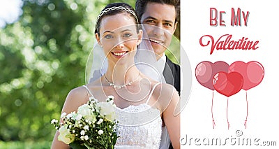 Composite image of smiling bride and groom in garden Stock Photo