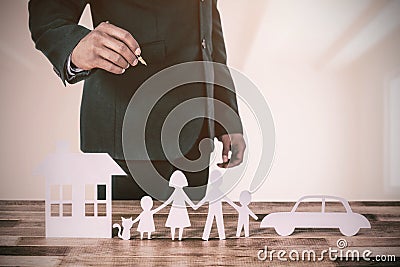 Composite image of underwriter drawing a family Stock Photo