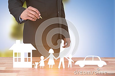 Composite image of underwriter drawing a family Stock Photo