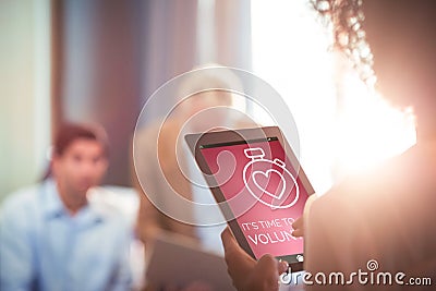 Composite image of volunteer text with icons on pink screen Stock Photo