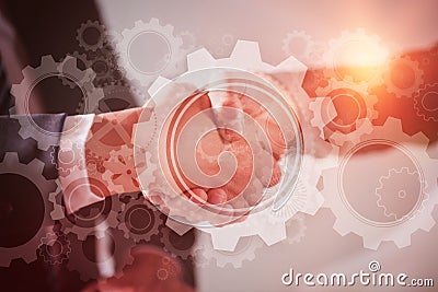 Composite image of white wheels and cogs on blue Stock Photo