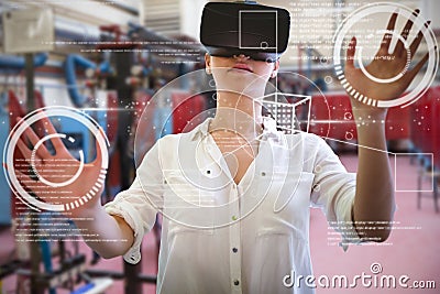 Composite image of woman using a virtual reality device Stock Photo