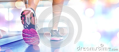 Composite image of womans feet running on the treadmill Stock Photo