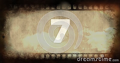 Composite of number 7 text over old rusty negative camera film with vignette, copy space Stock Photo