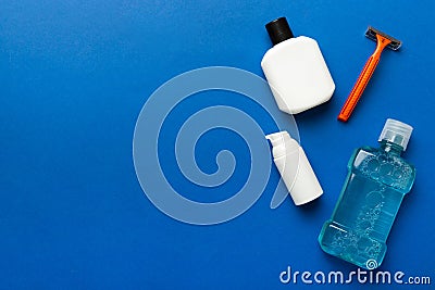 Composition with bath cosmetics on table. razor, toothpaste, soap, gel, toothbrush, mouthwash and other various Stock Photo