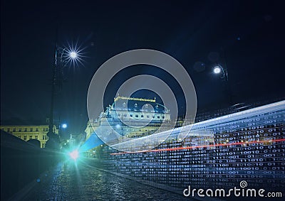 Composition of binary coding over cityscape at night Stock Photo