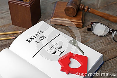 Composition with book, gavel and house key Stock Photo