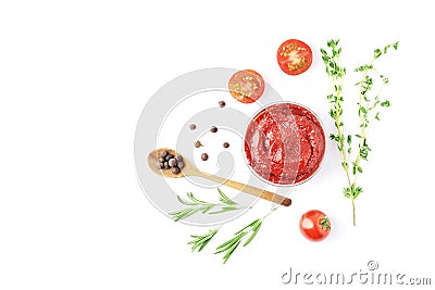 Composition of a bowl full of tomato sauce, spices, condiments Stock Photo