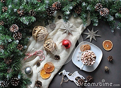 Composition of coffee with marshmallow, stars, fir tree. Winter flat lay Stock Photo