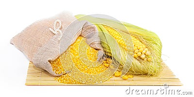 Composition from corn, maize flour in sack on the mat Stock Photo