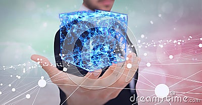 Composition of cube of network of digital icons over hand of businessman Stock Photo